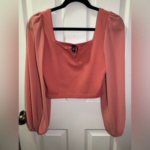 Peach crop top with sheer sleeves